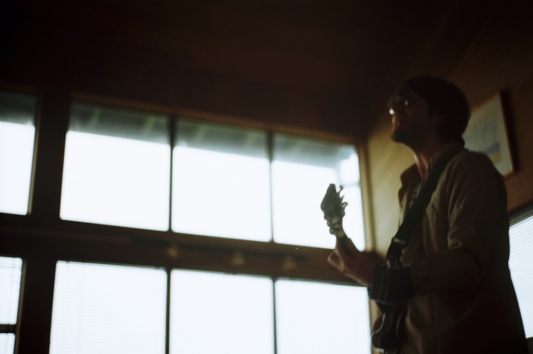 senior woman playing guitar
