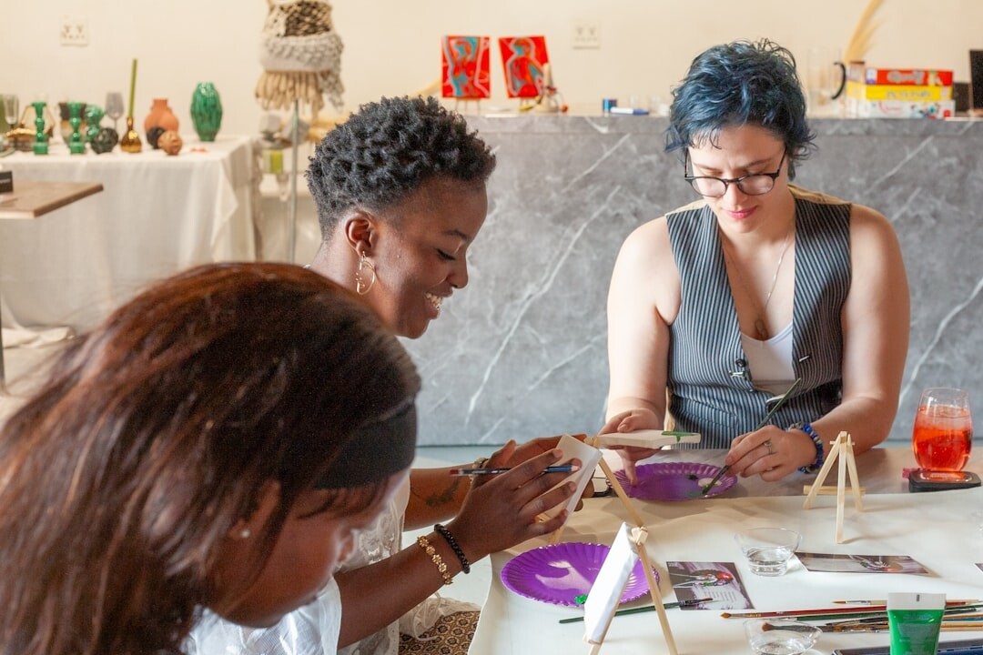 Slovak seniors painting together in a creative art workshop