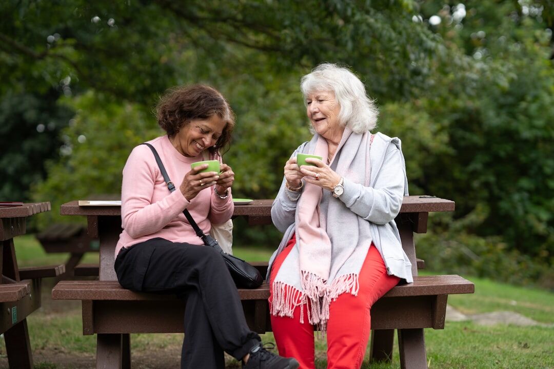 seniors chatting in park